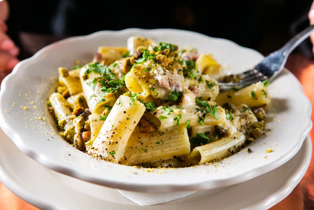 Dish Osteria and Bar signature dishes Rigatoni Alla Scamorza, Spaghetti Ai Frutti Di Mare, Grilled Octopus, Grigliata Mista Di Pesce